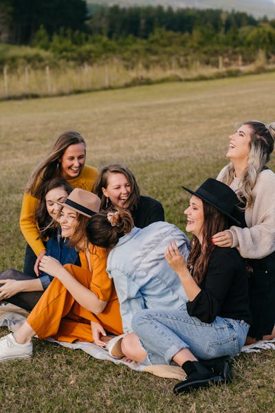 Friends laughing together outdoors